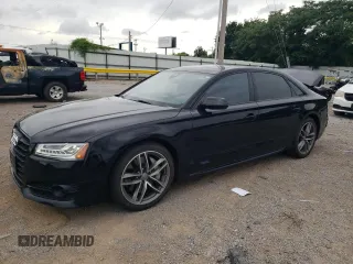 2017 Audi A8 with VIN WAU44AFD7HN010560, listed as a Copart auction lot 60020315 with 86,260 mi miles and Salvage title. Bid and sale history available at DreamBid. Image 1.