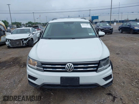 2020 Volkswagen Tiguan S with VIN 3VV0B7AX0LM140910, listed as a IAAI auction lot 42622385 with 80,998 mi miles and . Bid and sale history available at DreamBid. Image 12.