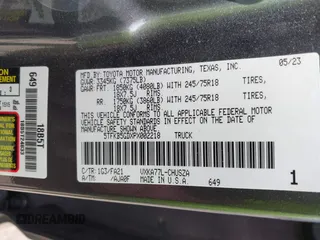 2023 Toyota Tundra with VIN 5TFKB5GDXPX002218, listed as a IAAI auction lot 41932719 with 71,335 mi miles and . Bid and sale history available at DreamBid. Image 9.