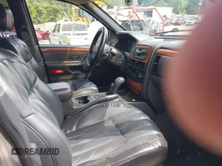 1999 Jeep Grand Cherokee Limited with VIN 1J4GW68N9XC808639, listed as a IAAI auction lot 42521785 with 156,864 mi miles and . Bid and sale history available at DreamBid. Image 5.