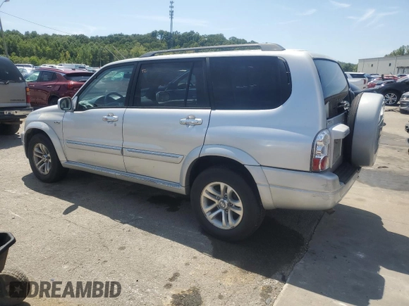 2004 Suzuki XL7 LX with VIN JS3TX92V644109794, listed as a Copart auction lot 68244184 with 107,769 mi miles and Salvage title. Bid and sale history available at DreamBid. Image 2.