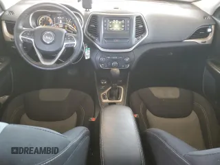 2016 Jeep Cherokee Altitude with VIN 1C4PJMAS3GW338230, listed as a Copart auction lot 52555605 with 107,732 mi miles and Salvage title. Bid and sale history available at DreamBid. Image 8.