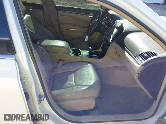 2014 Chrysler 300 with VIN 2C3CCAAGXEH377111, listed as a IAAI auction lot 41329879 with 147,680 mi miles. Bid and sale history available at carsss.com. Image 5.