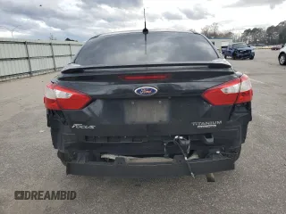 2014 Ford Focus Titanium with VIN 1FADP3J22EL221898, listed as a Copart auction lot 47867325 with 97,806 mi miles and Salvage Title. Bid and sale history available at DreamBid. Image 6.