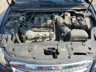 2012 Ford Taurus Limited with VIN 1FAHP2JW7CG137015, listed as a Copart auction lot 63490825 with 135,784 mi miles and Clean title. Bid and sale history available at DreamBid. Image 11.