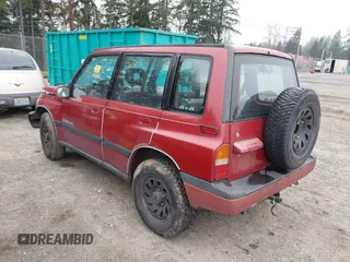1995 Suzuki Sidekick z VIN JS3TD03V3S4106626, wystawiony jako IAAI lot #41877506 z przebiegiem 166 928 mil mil oraz . Historia ofert i sprzedaży dostępna na DreamBid. Obrazek 3.