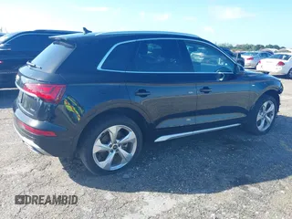 2023 Audi Q5 S line Premium Plus z VIN WA1EAAFY5P2128250, wystawiony jako IAAI lot #40666613 z przebiegiem 27 940 mil mil oraz . Historia ofert i sprzedaży dostępna na DreamBid. Obrazek 4.