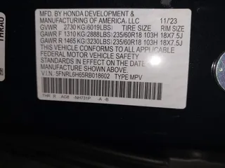 2024 Honda Odyssey EX-L with VIN 5FNRL6H65RB018602, listed as a IAAI auction lot 40823286 with 11,252 mi miles and . Bid and sale history available at DreamBid. Image 9.