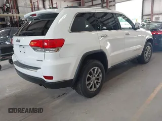 2016 Jeep Grand Cherokee Limited with VIN 1C4RJFBG2GC490483, listed as a IAAI auction lot 42596513 with 113,937 mi miles and . Bid and sale history available at DreamBid. Image 4.