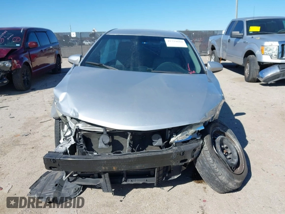 2014 Toyota Camry L with VIN 4T1BF1FK7EU856848, listed as a IAAI auction lot 41729604 with 100,148 mi miles. Bid and sale history available at carsss.com. Image 12.