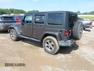 2016 Jeep Wrangler Unlimited Sahara with VIN 1C4BJWEG7GL340074, listed as a IAAI auction lot 42434763 with 81,095 mi miles and . Bid and sale history available at DreamBid. Image 3.