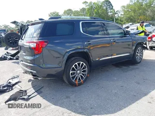 2021 GMC Acadia Denali with VIN 1GKKNPLS1MZ224156, listed as a IAAI auction lot 42105103 with 52,353 mi miles and . Bid and sale history available at carsss.com. Image 4.