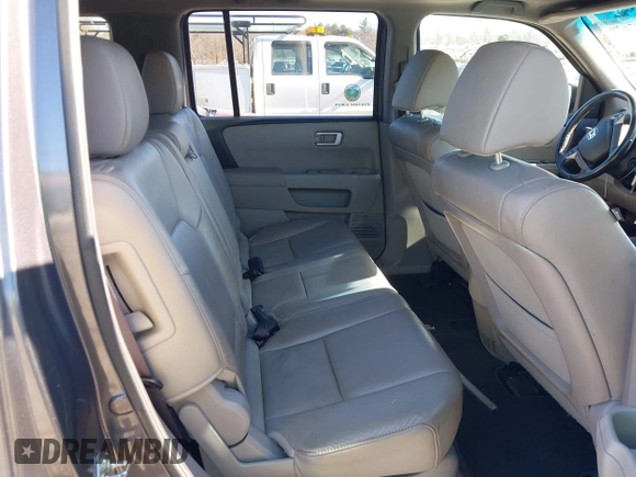 2015 Honda Pilot EX-L with VIN 5FNYF4H52FB070456, listed as a IAAI auction lot 41247639 with 182,998 mi miles and . Bid and sale history available at carsss.com. Image 8.