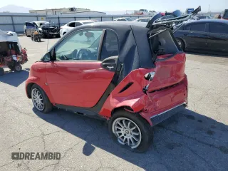 2014 Smart fortwo Pure z VIN WMEEJ3BA6EK745679, wystawiony jako Copart lot #56242784 z przebiegiem 86 991 mil mil oraz Szkoda całkowita • Salvage title. Historia ofert i sprzedaży dostępna na DreamBid. Obrazek 2.