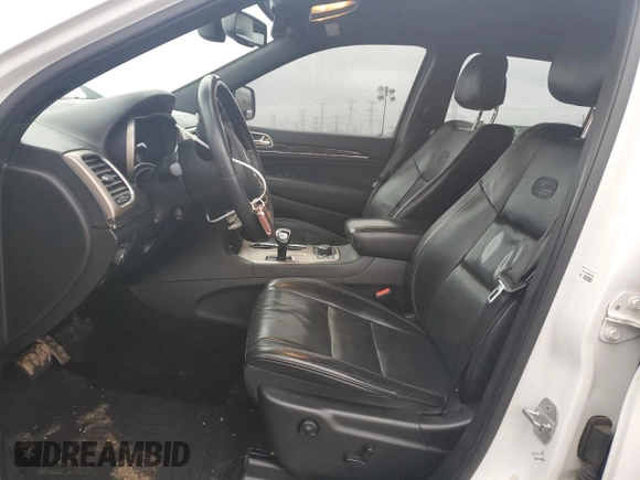 2014 Jeep Grand Cherokee Overland with VIN 1C4RJFCG7EC572298, listed as a Copart auction lot 83970004 with 104,861 mi miles and Salvage Title. Bid and sale history available at DreamBid. Image 7.