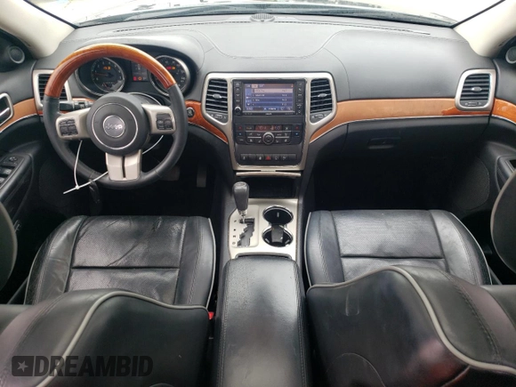 2013 Jeep Grand Cherokee Overland with VIN 1C4RJECG5DC528650, listed as a Copart auction lot 51581684 with 141,050 mi miles and Clean Title. Bid and sale history available at carsss.com. Image 8.