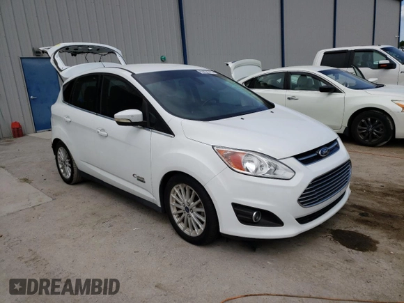 2015 Ford C-Max Energi SEL with VIN 1FADP5CU9FL109434, listed as a Copart auction lot 63836373 with 77,260 mi miles. Bid and sale history available at carsss.com. Image 4.