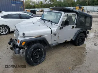 2002 Jeep Wrangler Sport with VIN 1J4FA49S32P733909, listed as a Copart auction lot 72776204 with 157,508 mi miles and Non Repairable. Bid and sale history available at carsss.com. Image 1.