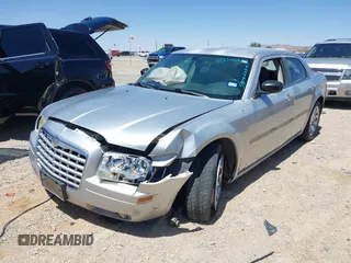 2007 Chrysler 300 with VIN 2C3KA43RX7H664582, listed as a IAAI auction lot 42106297 with 141,866 mi miles and . Bid and sale history available at DreamBid. Image 17.