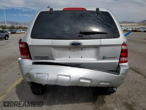 2011 Ford Escape Hybrid z VIN 1FMCU4K35BKA08355, wystawiony jako Copart lot #49155955 z przebiegiem 80 953 mil mil oraz Szkoda całkowita • Salvage title. Historia ofert i sprzedaży dostępna na DreamBid. Obrazek 6.