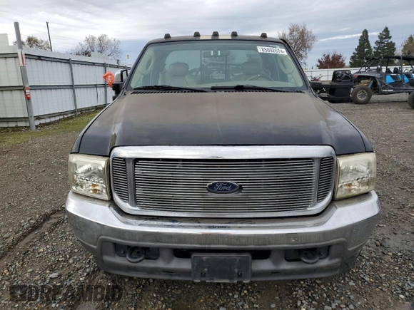 2003 Ford Super Duty F-250 XL with VIN 1FTNX21L13EB63351, listed as a Copart auction lot 85092674 with 265,515 mi miles and Salvage Title. Bid and sale history available at carsss.com. Image 5.