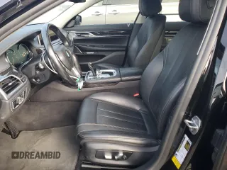 2018 BMW 7 Series 740i with VIN WBA7E2C58JG743269, listed as a Copart auction lot 84905044 with 74,951 mi miles and Salvage Title. Bid and sale history available at carsss.com. Image 7.