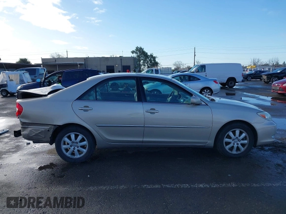 2004 Toyota Camry LE with VIN 4T1BF30K24U577908, listed as a IAAI auction lot 41591147 with 151,678 mi miles and . Bid and sale history available at DreamBid. Image 14.