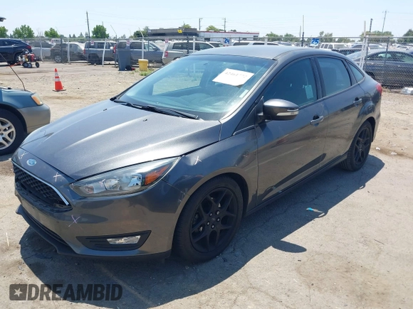 2016 Ford Focus SE z VIN 1FADP3F25GL329217, wystawiony jako IAAI lot #42461772 z przebiegiem 85 070 mil mil oraz . Historia ofert i sprzedaży dostępna na DreamBid. Obrazek 2.