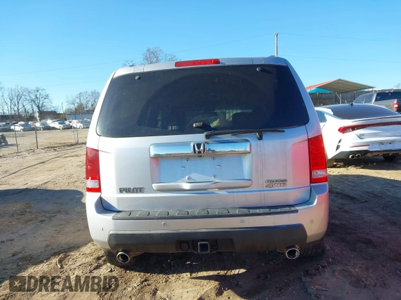2009 Honda Pilot Touring with VIN 5FNYF48979B008851, listed as a IAAI auction lot 41252736 with 183,292 mi miles and . Bid and sale history available at carsss.com. Image 16.
