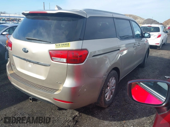 2015 Kia Sedona LX with VIN KNDMB5C15F6044093, listed as a IAAI auction lot 41843977 with 169,157 mi miles. Bid and sale history available at carsss.com. Image 4.