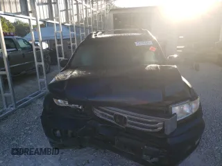 2012 Honda Ridgeline RT with VIN 5FPYK1F21CB458655, listed as a Copart auction lot 73167424 with 134,725 mi miles and Salvage title. Bid and sale history available at DreamBid. Image 5.