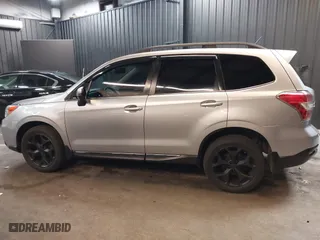 2015 Subaru Forester 2.5i Touring with VIN JF2SJAUC8FH468456, listed as a IAAI auction lot 41132284 with 188,408 mi miles. Bid and sale history available at carsss.com. Image 15.