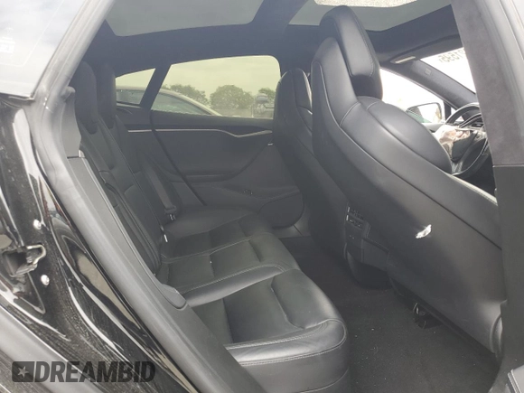 2019 Tesla Model S 75D with VIN 5YJSA1E25KF299740, listed as a Copart auction lot 55821595 with 140,385 mi miles and Salvage title. Bid and sale history available at DreamBid. Image 10.