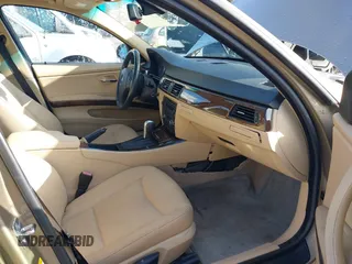 2007 BMW 3 Series 328xi with VIN WBAVC93577KX57207, listed as a IAAI auction lot 42024089 with 119,521 mi miles. Bid and sale history available at carsss.com. Image 5.