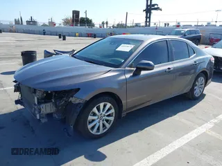 2019 Toyota Camry LE with VIN 4T1B11HK2KU240465, listed as a IAAI auction lot 42095075 with 67,852 mi miles and . Bid and sale history available at DreamBid. Image 19.