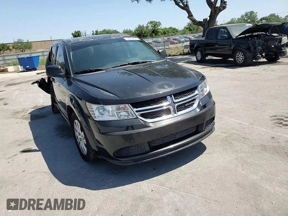 2013 Dodge Journey American Value with VIN 3C4PDCAB6DT709996, listed as a Copart auction lot 52362635 with 104,808 mi miles and Salvage Title. Bid and sale history available at DreamBid. Image 12.