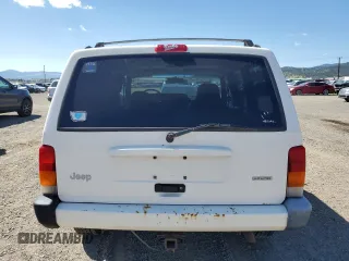 2000 Jeep Cherokee with VIN 1J4FF48S6YL169224, listed as a Copart auction lot 64411145 with 237,553 mi miles and Clean title. Bid and sale history available at DreamBid. Image 6.
