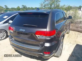 2014 Jeep Grand Cherokee Overland with VIN 1C4RJECG8EC409976, listed as a IAAI auction lot 41821685 with 186,105 mi miles. Bid and sale history available at carsss.com. Image 4.