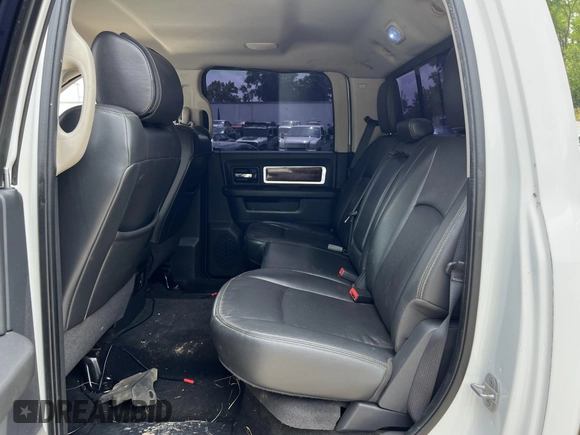 2012 Ram 2500 Laramie z VIN 3C6UD5FL6CG139061, wystawiony jako IAAI lot #42799042 z przebiegiem 257 757 mil mil oraz . Historia ofert i sprzedaży dostępna na DreamBid. Obrazek 7.