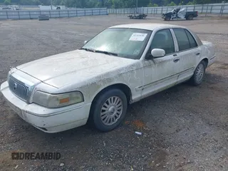 2006 Mercury Grand Marquis LS Premium z VIN 2MEFM75V96X649641, wystawiony jako IAAI lot #42315126 z przebiegiem 144 173 mil mil oraz . Historia ofert i sprzedaży dostępna na DreamBid. Obrazek 2.