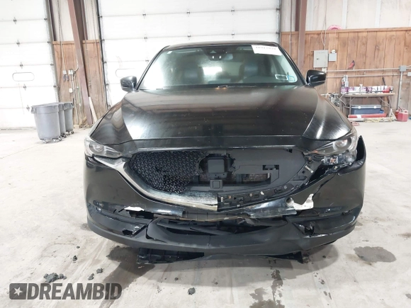 2017 Mazda CX-5 Grand Touring with VIN JM3KFBDL6H0143013, listed as a IAAI auction lot 41912979 with 122,890 mi miles. Bid and sale history available at carsss.com. Image 6.