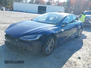 2016 Tesla Model S 90D with VIN 5YJSA1E25GF144614, listed as a IAAI auction lot 40941311 with 83,587 mi miles and . Bid and sale history available at DreamBid. Image 13.