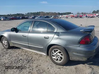 2004 Pontiac Grand Am SE1 with VIN 1G2NF52E14C200291, listed as a IAAI auction lot 41490926 with 162,985 mi miles. Bid and sale history available at carsss.com. Image 6.