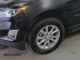 2021 Chevrolet Equinox LT with VIN 2GNAXTEV7M6103944, listed as a IAAI auction lot 42229637 with 62,682 mi miles and . Bid and sale history available at DreamBid. Image 18.