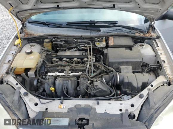 2005 Ford Focus S with VIN 1FAFP34N55W115653, listed as a Copart auction lot 63043315 with 110,593 mi miles and Salvage title. Bid and sale history available at DreamBid. Image 11.