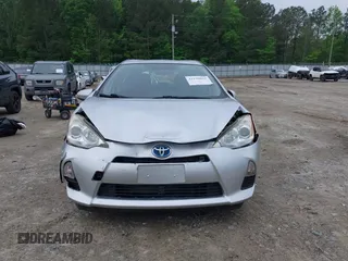 2014 Toyota Prius One with VIN JTDKDTB34E1562443, listed as a IAAI auction lot 42110012 with 144,120 mi miles and . Bid and sale history available at DreamBid. Image 6.