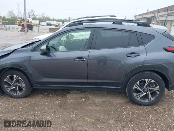 2024 Subaru Crosstrek Premium z VIN JF2GUADC0RH332534, wystawiony jako IAAI lot #42257526 z przebiegiem 14 944 mil mil oraz . Historia ofert i sprzedaży dostępna na DreamBid. Obrazek 14.