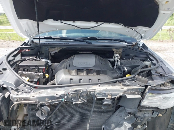 2014 Jeep Grand Cherokee Summit with VIN 1C4RJFJT6EC281114, listed as a IAAI auction lot 42497582 with 128,181 mi miles and . Bid and sale history available at DreamBid. Image 10.