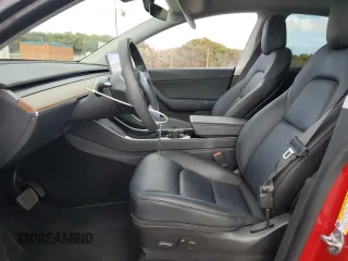 2021 Tesla Model Y Standard Range z VIN 5YJYGDED7MF111377, wystawiony jako Copart lot #45772075 z przebiegiem 34 331 mil mil oraz Szkoda całkowita • Salvage title. Historia ofert i sprzedaży dostępna na DreamBid. Obrazek 7.
