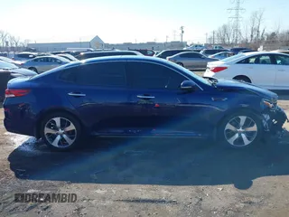 2019 Kia Optima LX with VIN 5XXGT4L35KG303814, listed as a IAAI auction lot 41769183 with 107,509 mi miles. Bid and sale history available at carsss.com. Image 13.